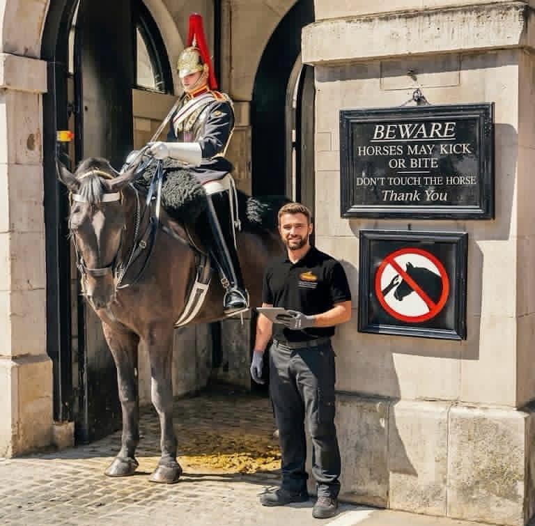 A Yellow Van Company mover in central London beside the Royal Horse Guards &mdash; family-run London removals firm trusted across the capital since 2011